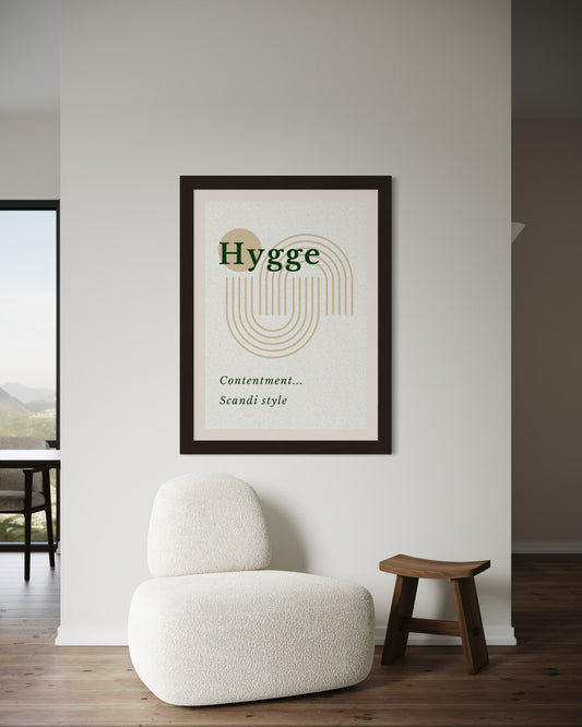 Framed artwork with 'Hygge' definition in a modern interior setting.