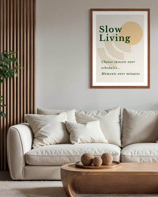 Living room with a 'Slow Living' poster on the wall above a beige sofa.