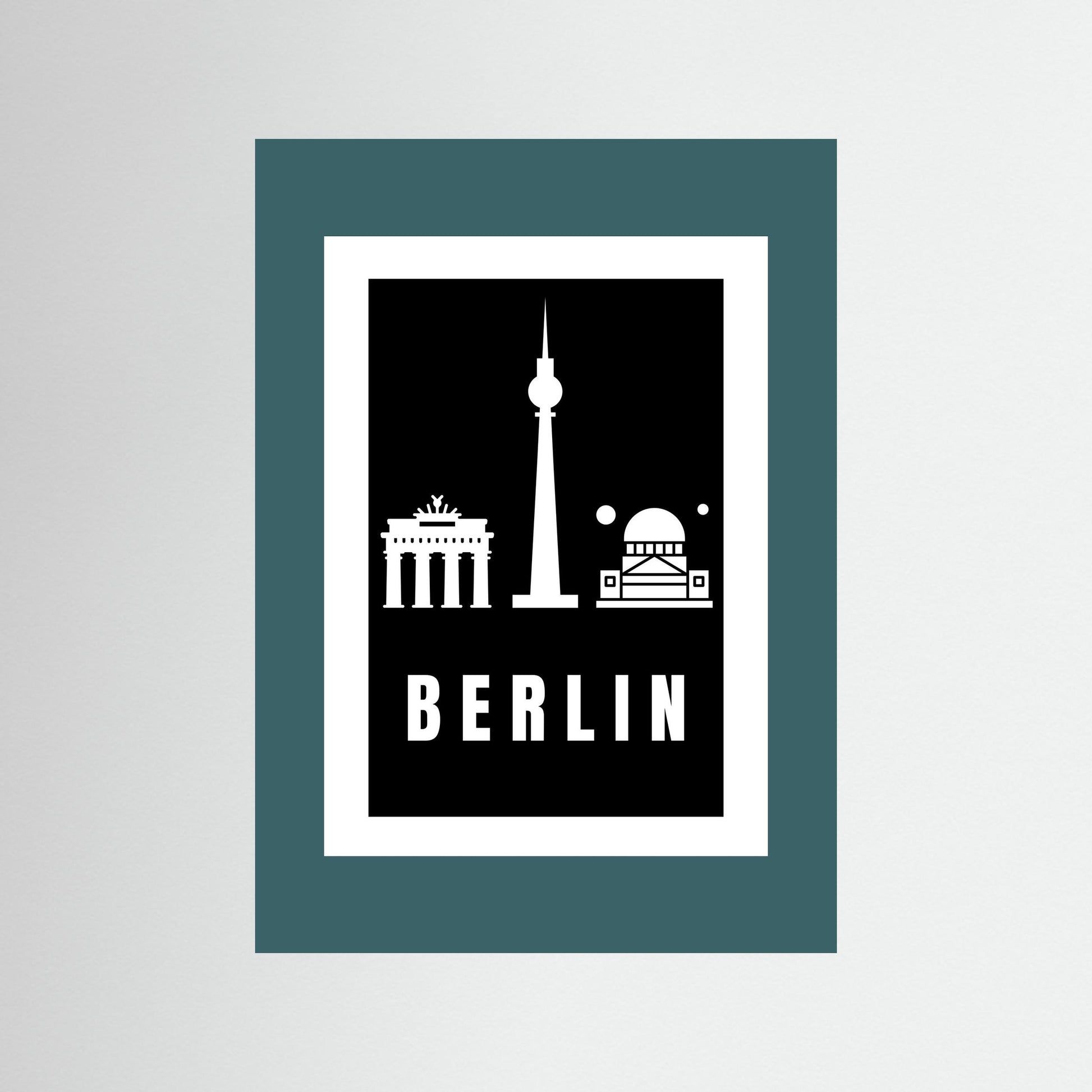 Unframed poster with Berlin landmarks and 'BERLIN' text on a black background and teal border