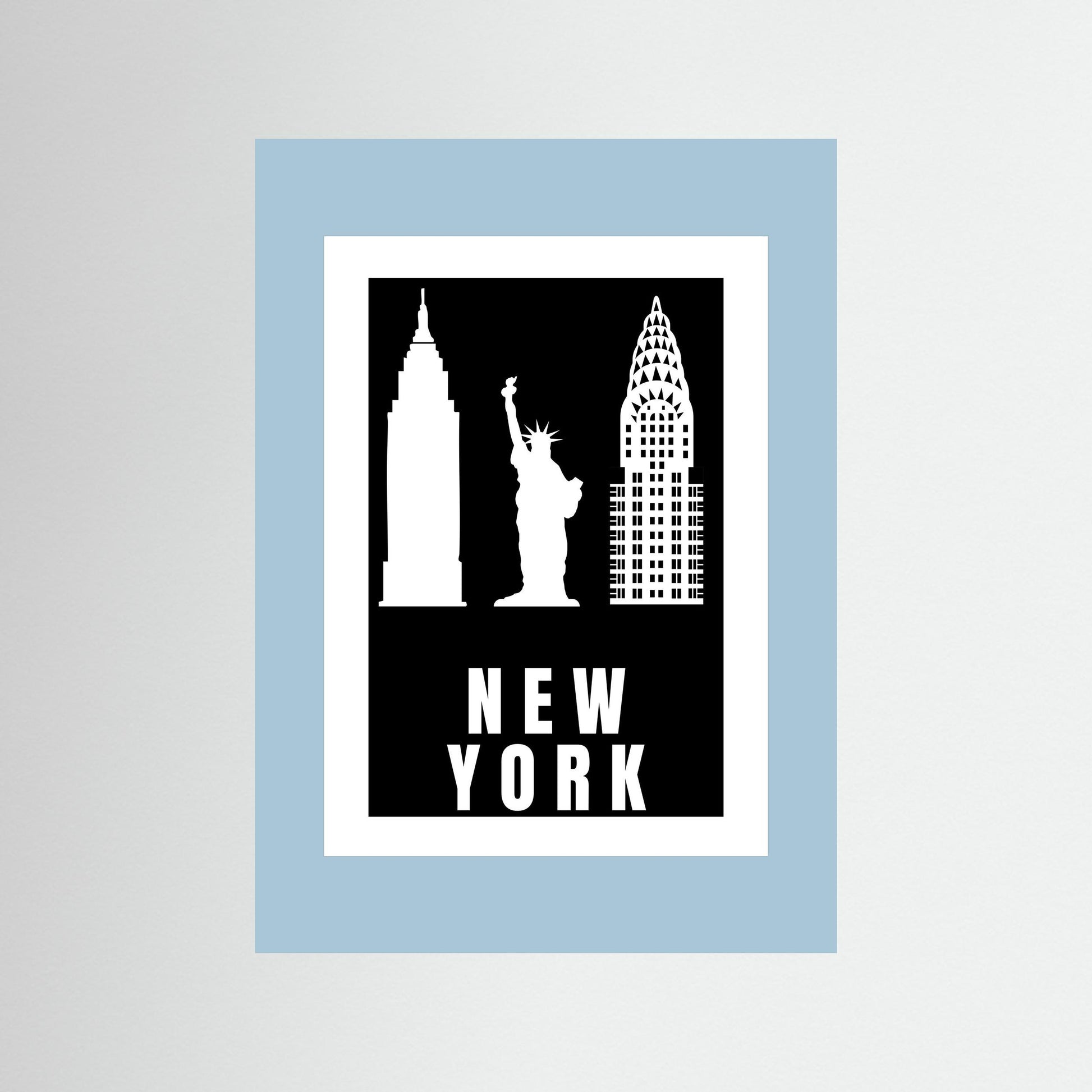 Unframed artwork with New York cityscape silhouette on a black background with a pale blue border