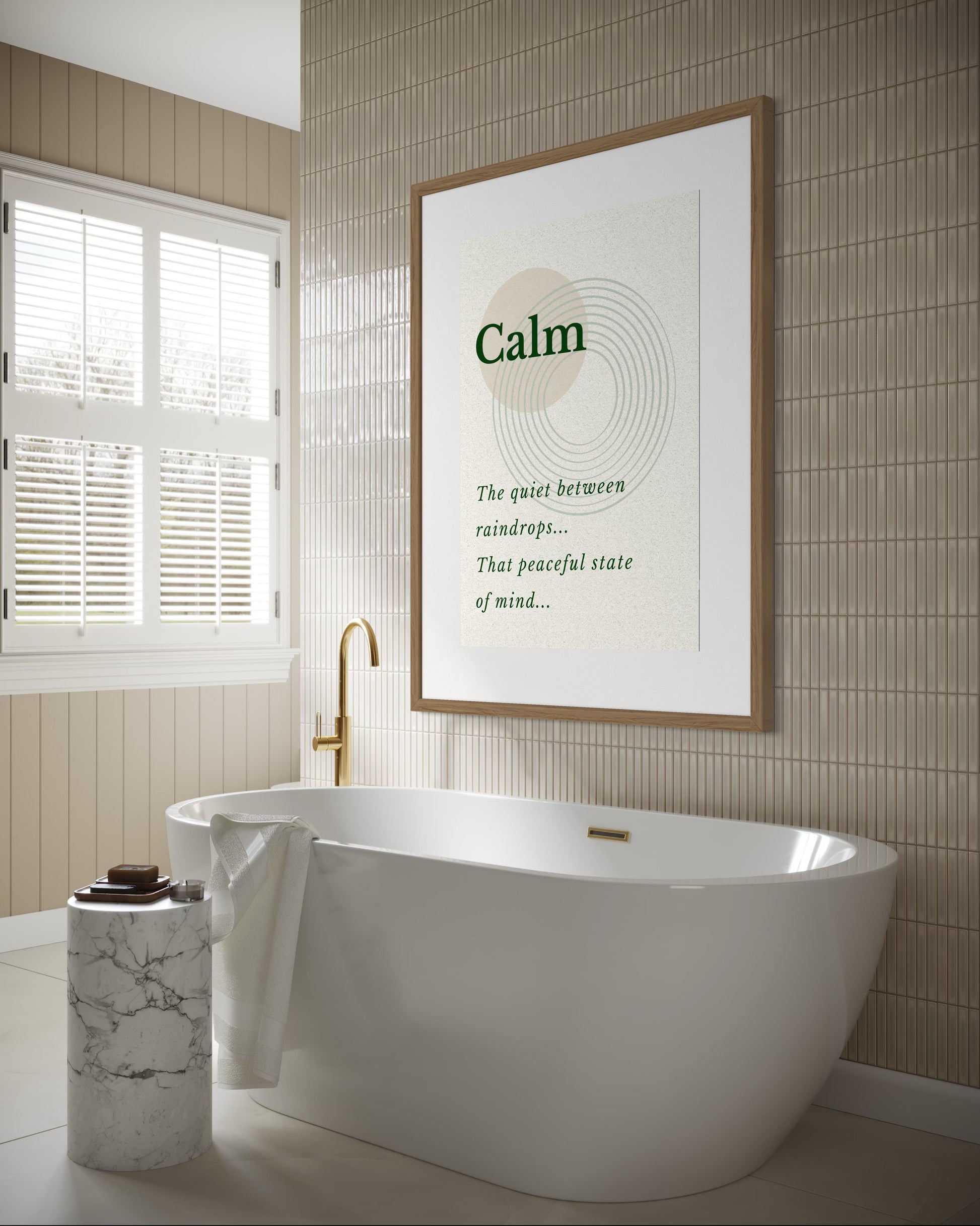 Bathroom with a freestanding bathtub, framed poster, and window.