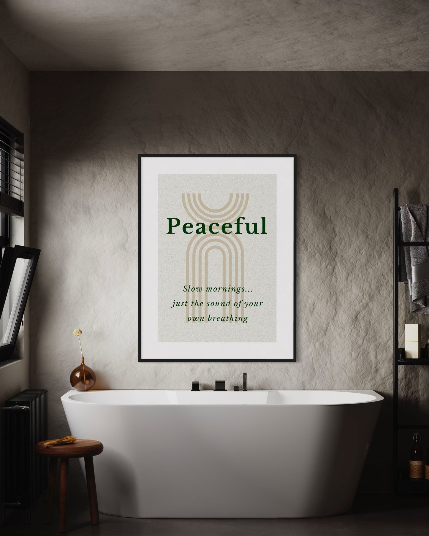 Bathroom with a framed poster reading 'Peaceful' above a bathtub.