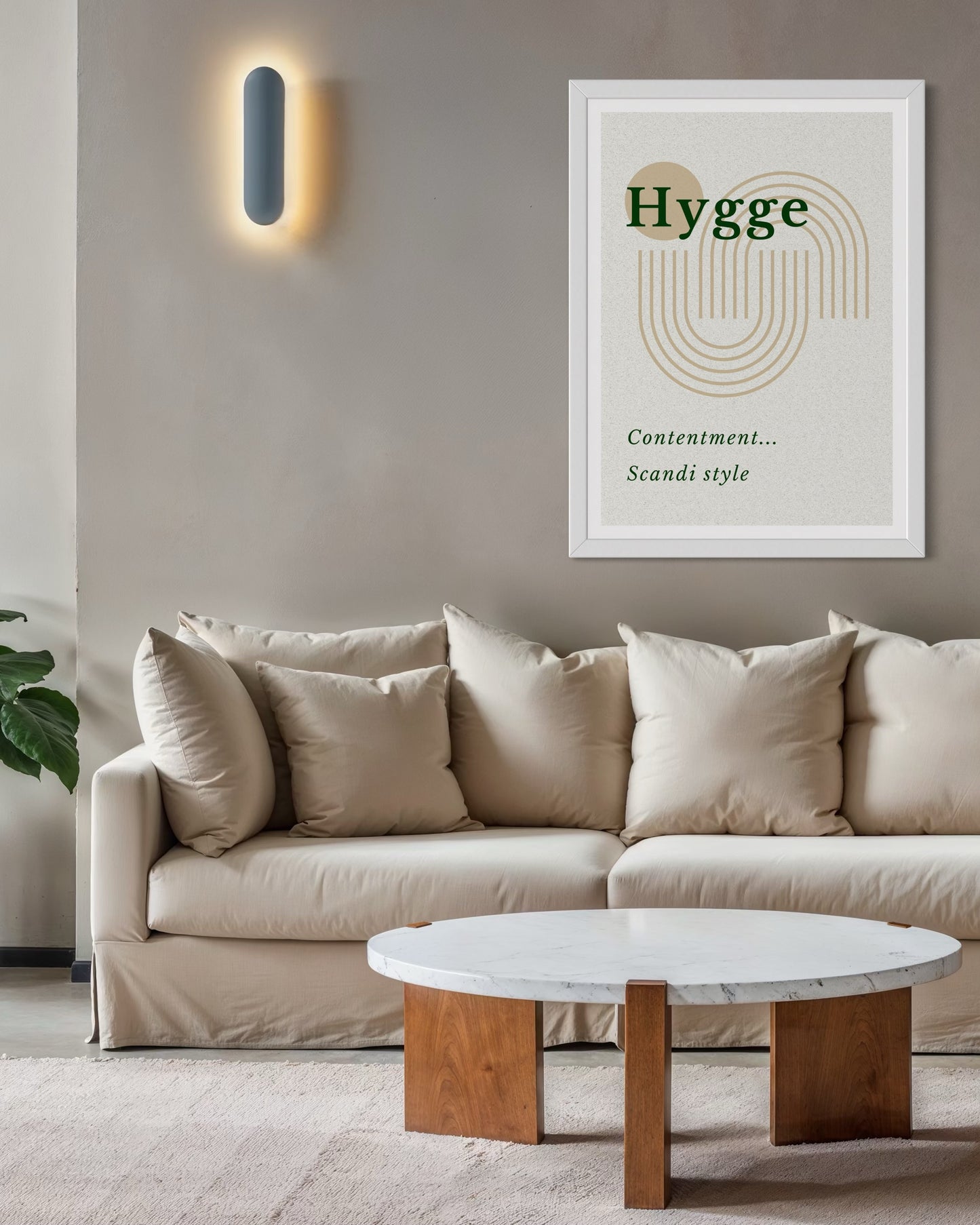 Living room with a beige sofa, marble coffee table, and 'Hygge' poster on the wall.