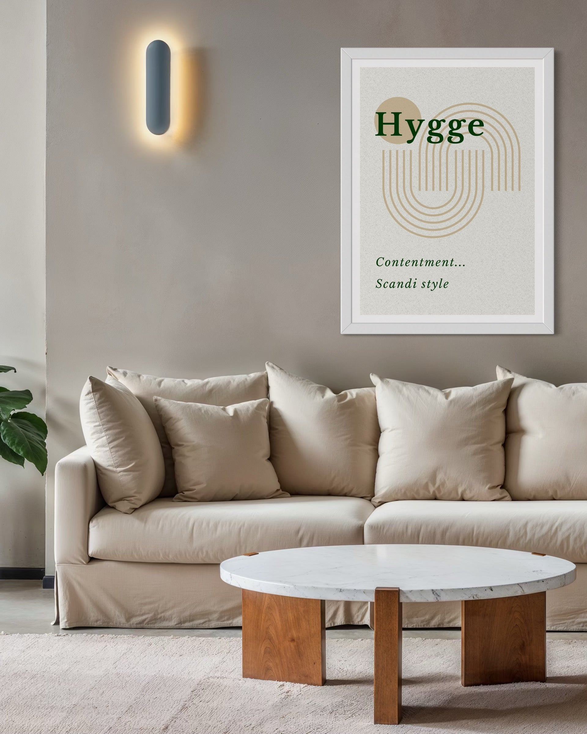Living room with a beige sofa, marble coffee table, and 'Hygge' poster on the wall.