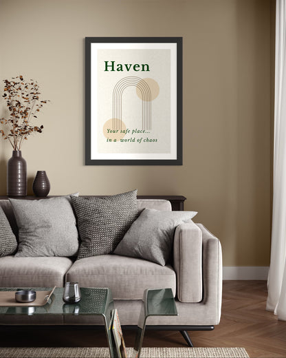 Living room with a gray sofa, coffee table, and framed artwork on the wall.