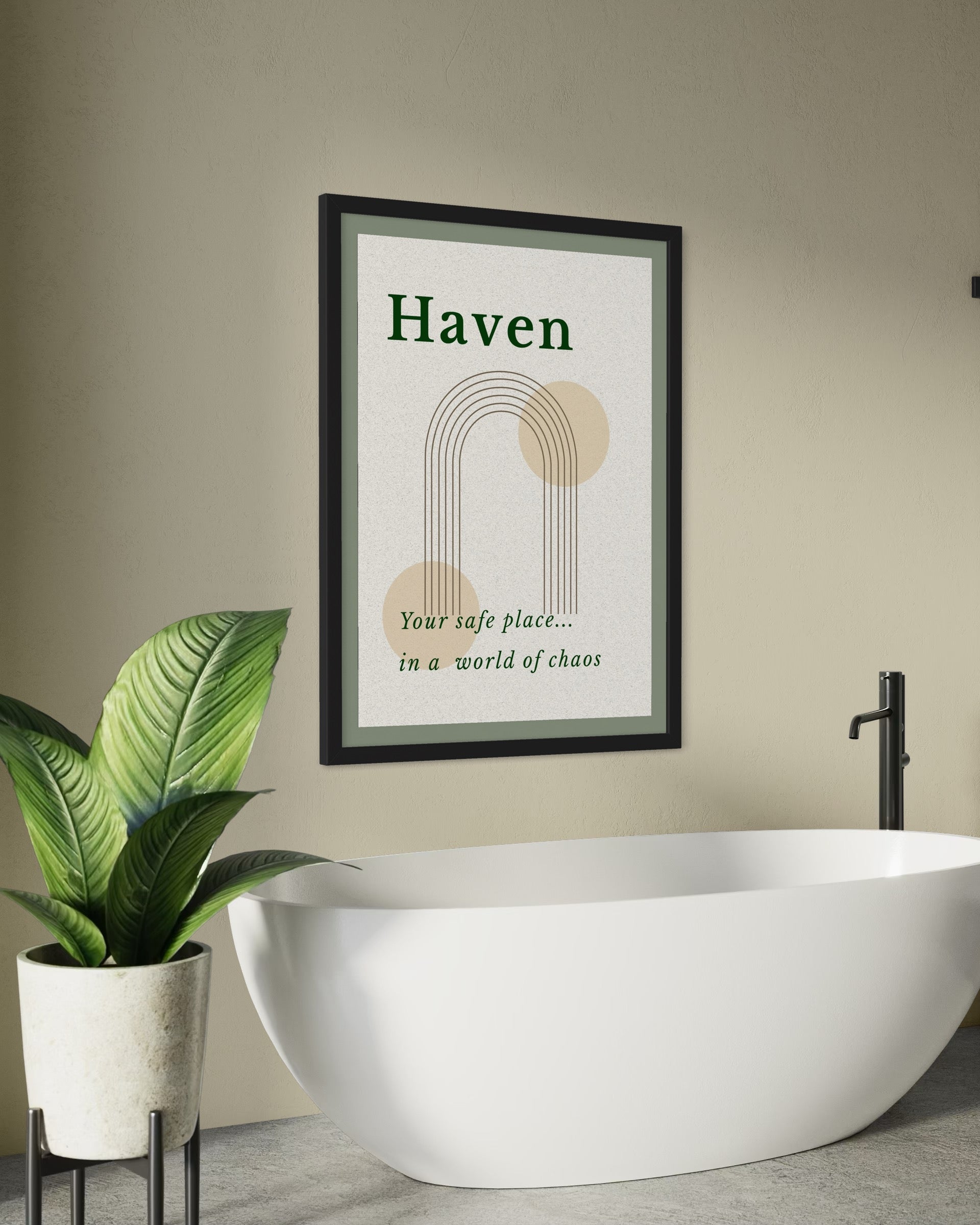 Framed artwork with 'Haven' text above a modern white bathtub and plant.