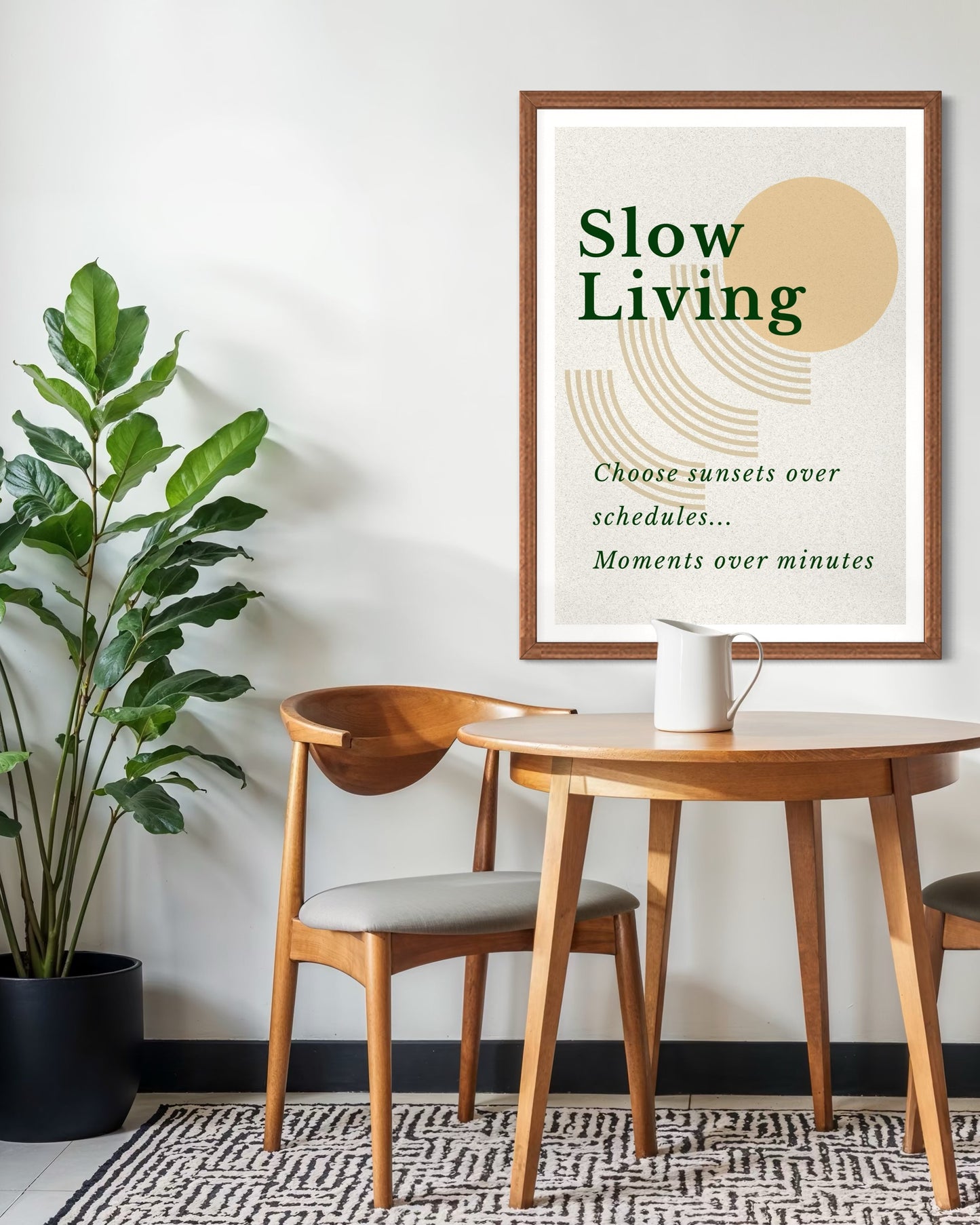 Dining area with wooden table, chairs, and a 'Slow Living' poster on the wall.