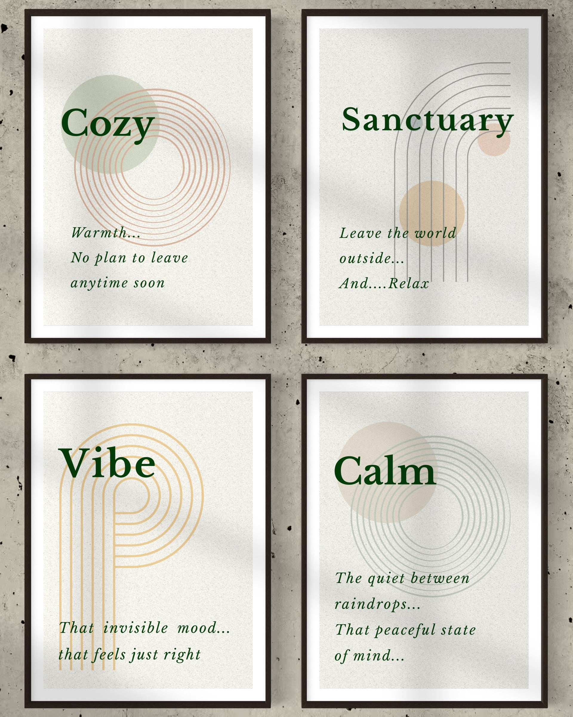Four framed prints with motivational phrases on a concrete wall background