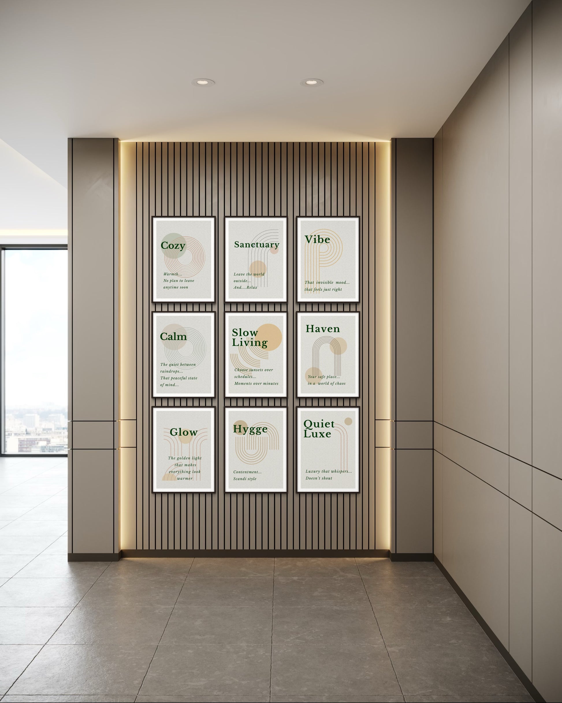 Wall with framed prints featuring motivational phrases in a modern interior setting.