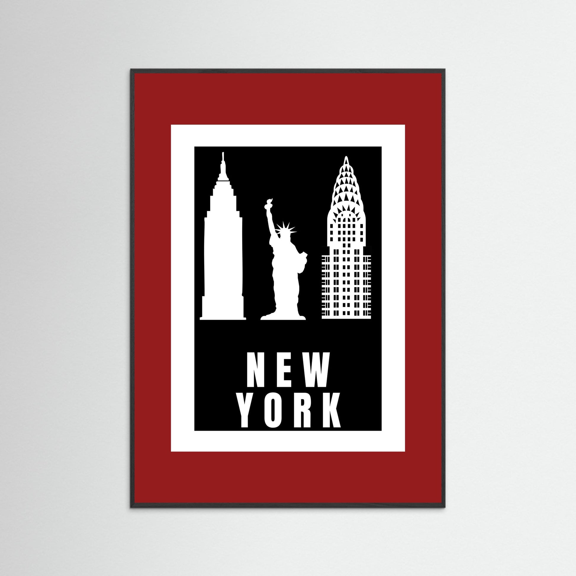 Framed artwork with silhouettes of New York landmarks on a black background with 'NEW YORK' text. with a deep red border