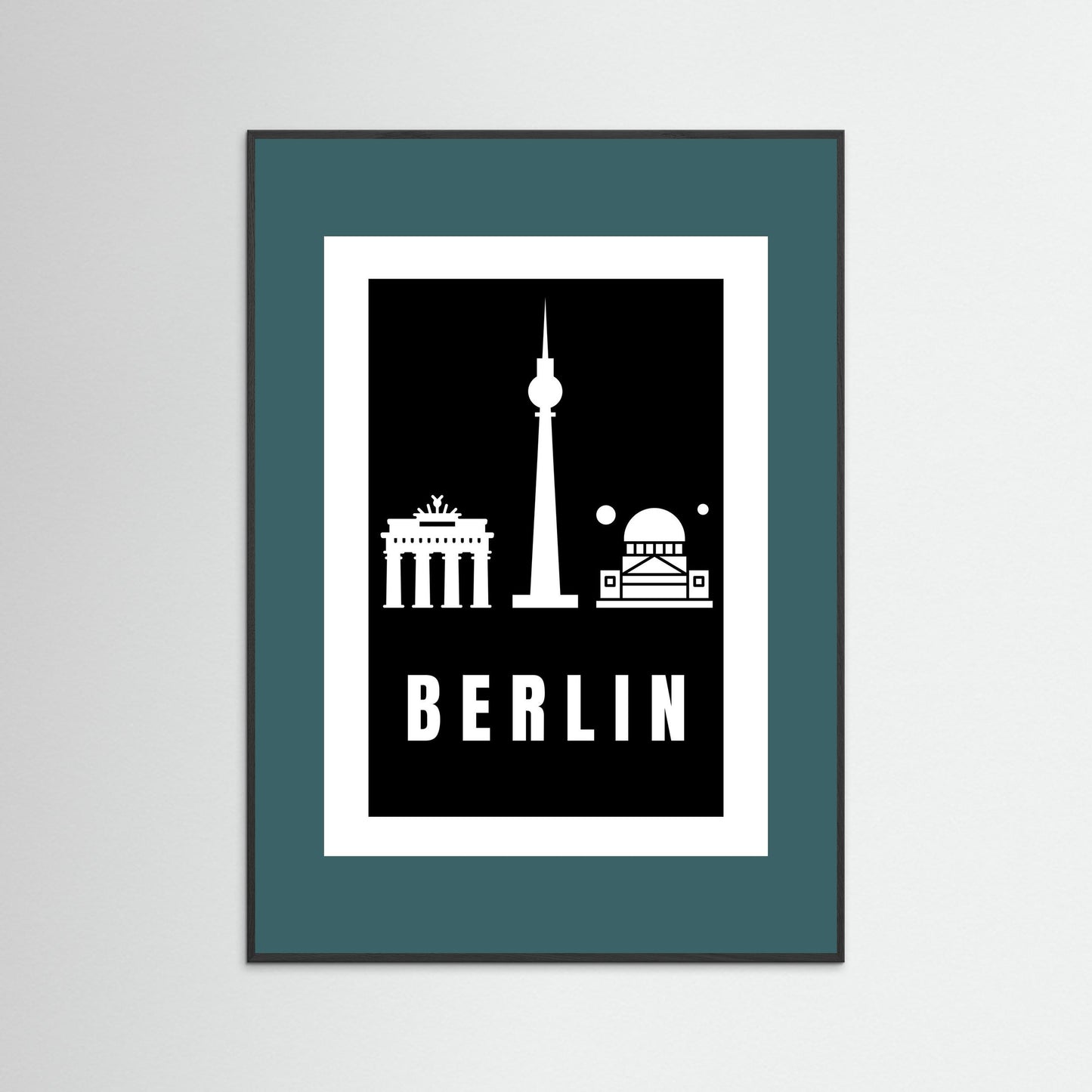 Framed poster with Berlin landmarks on a black background and a teal border.