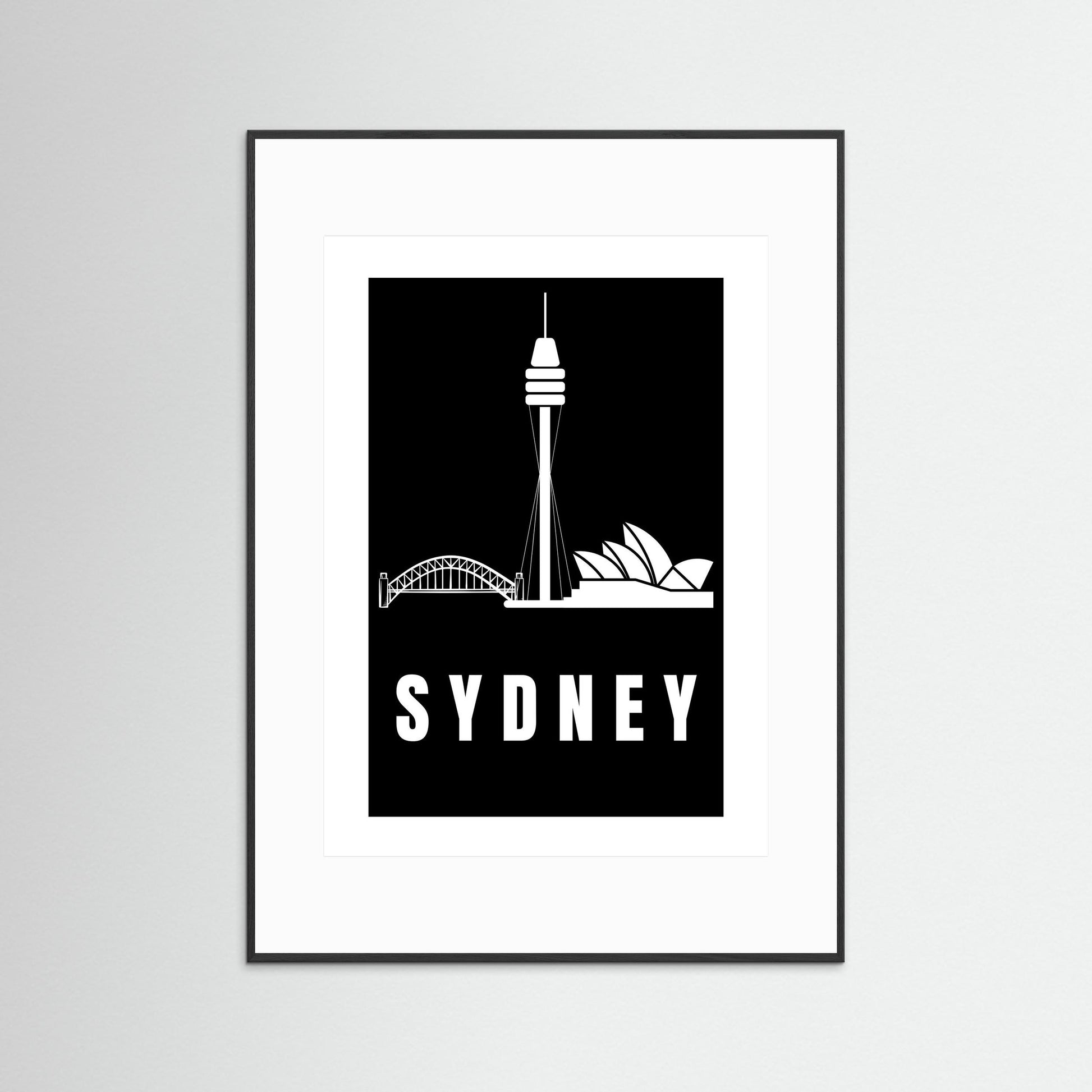 Framed artwork with Sydney skyline silhouette on a black background with a white boarder