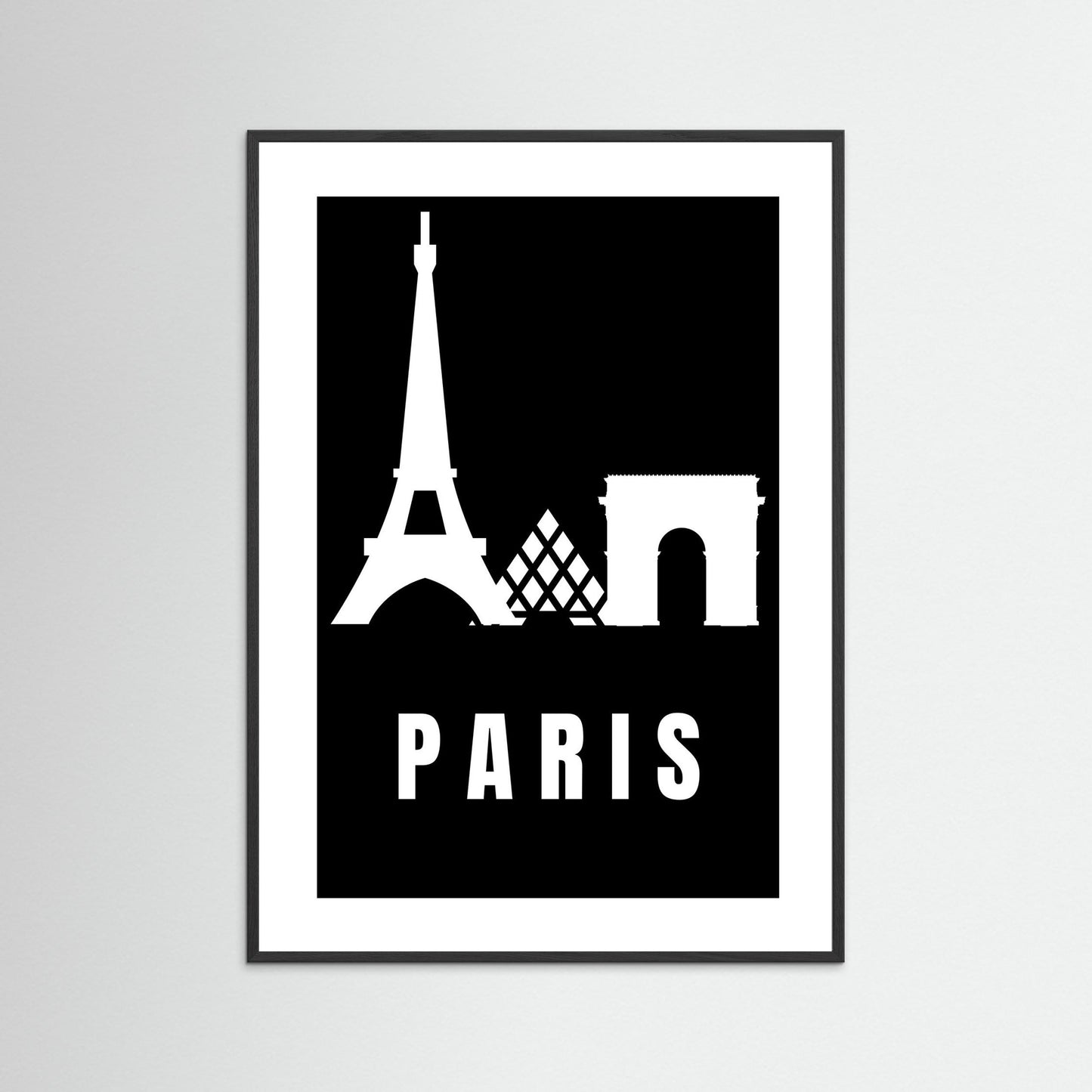 Framed poster with Eiffel Tower and Arc de Triomphe silhouettes and 'PARIS' text on a black background.