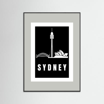 Framed artwork with Sydney skyline and 'Sydney' text on a black background and a light grey border
