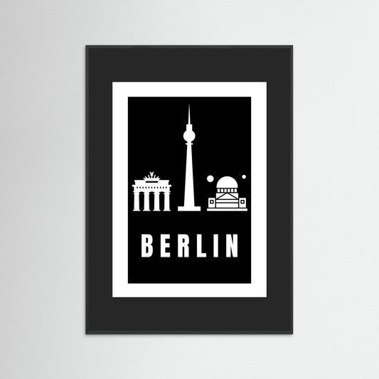 Unframed poster with Berlin landmarks on a black background with a black border